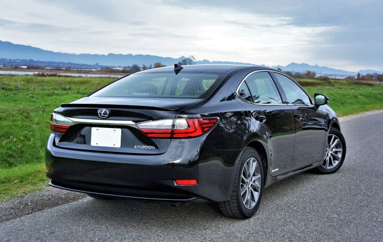 Front view of a silver 2017 Lexus ES 300h hybrid sedan parked outdoors